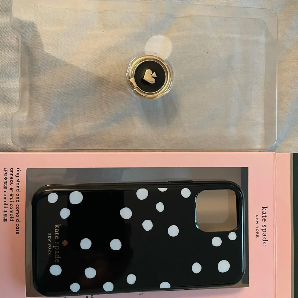 Kate Spade iPhone 11 Pro case with gold emblem stand